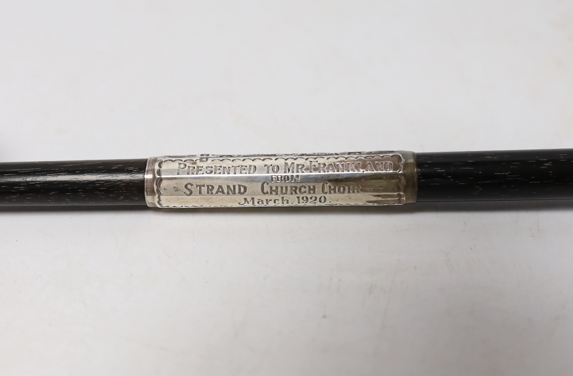 A cased George V silver mounted conductor's baton, two part baton with threaded joint, engraved dedication reading; ‘Presented to Mr. Frankland from Strand Church Choir March 1920’, hallmarked London 1919, case 24.5cm